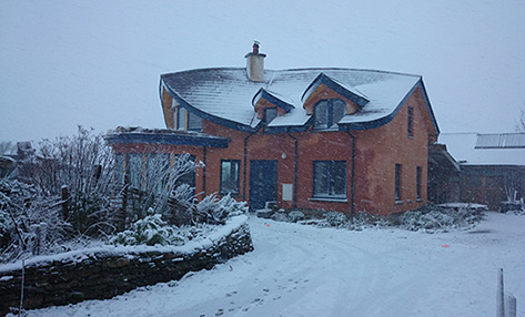 snow at the Mud and Wood House